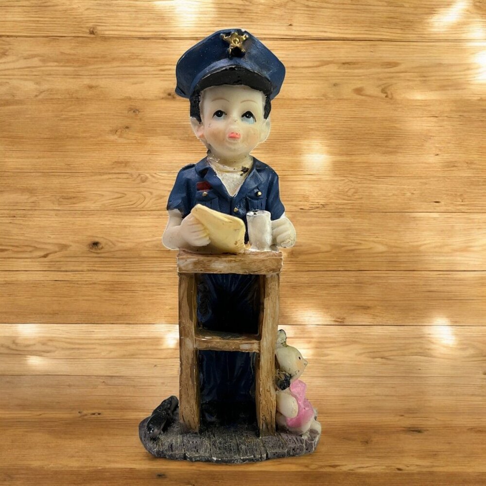 Police Officer Boy Figurine